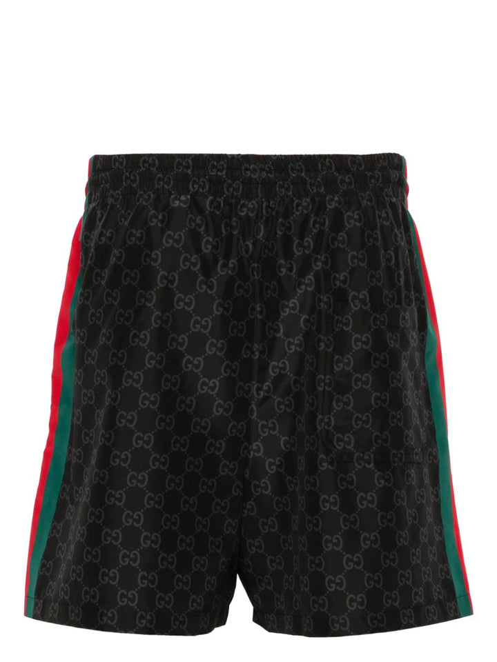 Gucci shorts de playa con estampado GG Supreme