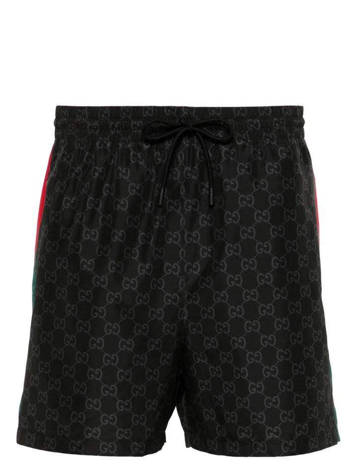 Gucci shorts de playa con estampado GG Supreme